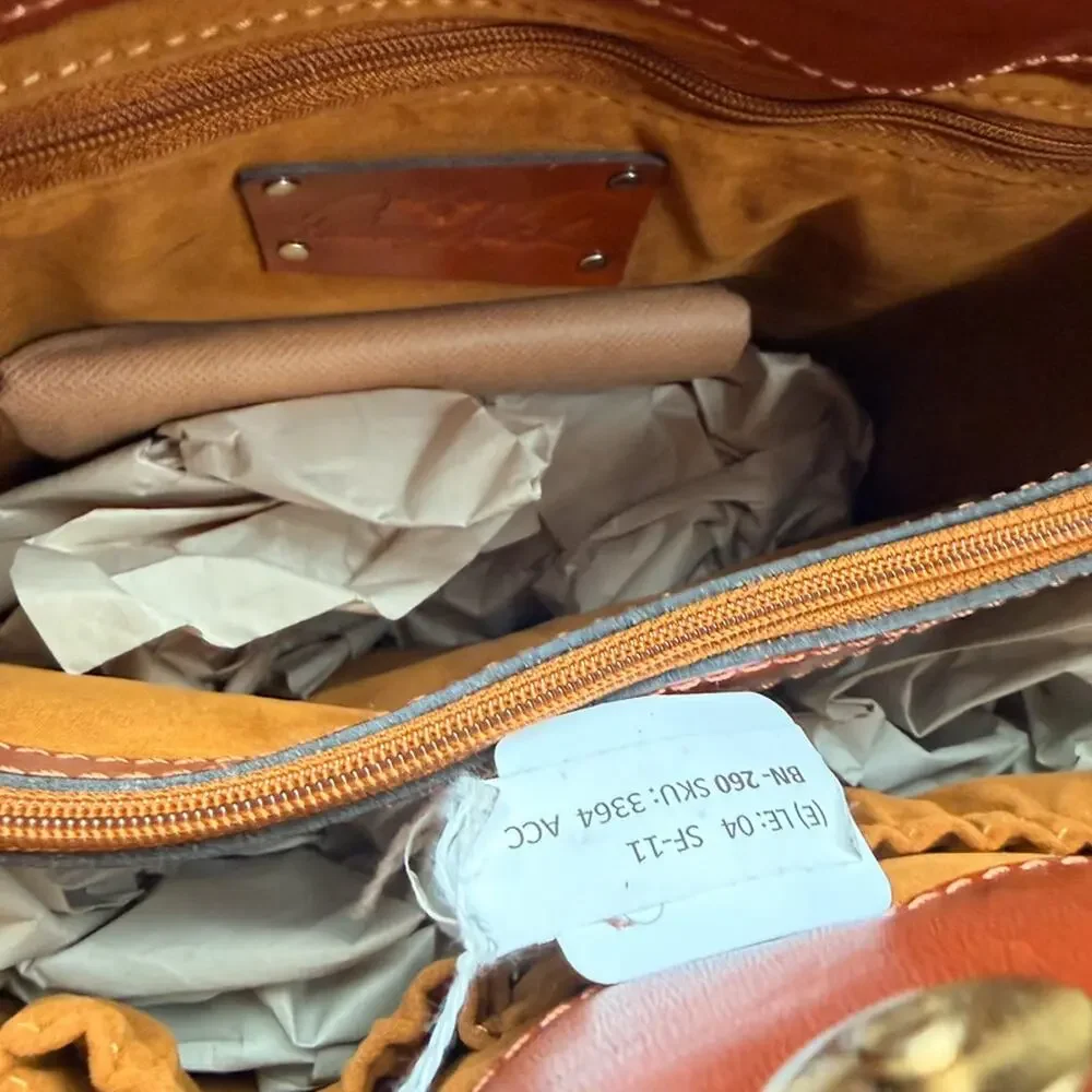 Patricia Nash Leather Accadia Bucket Drawstring Crossbody Bag Tan Cutout